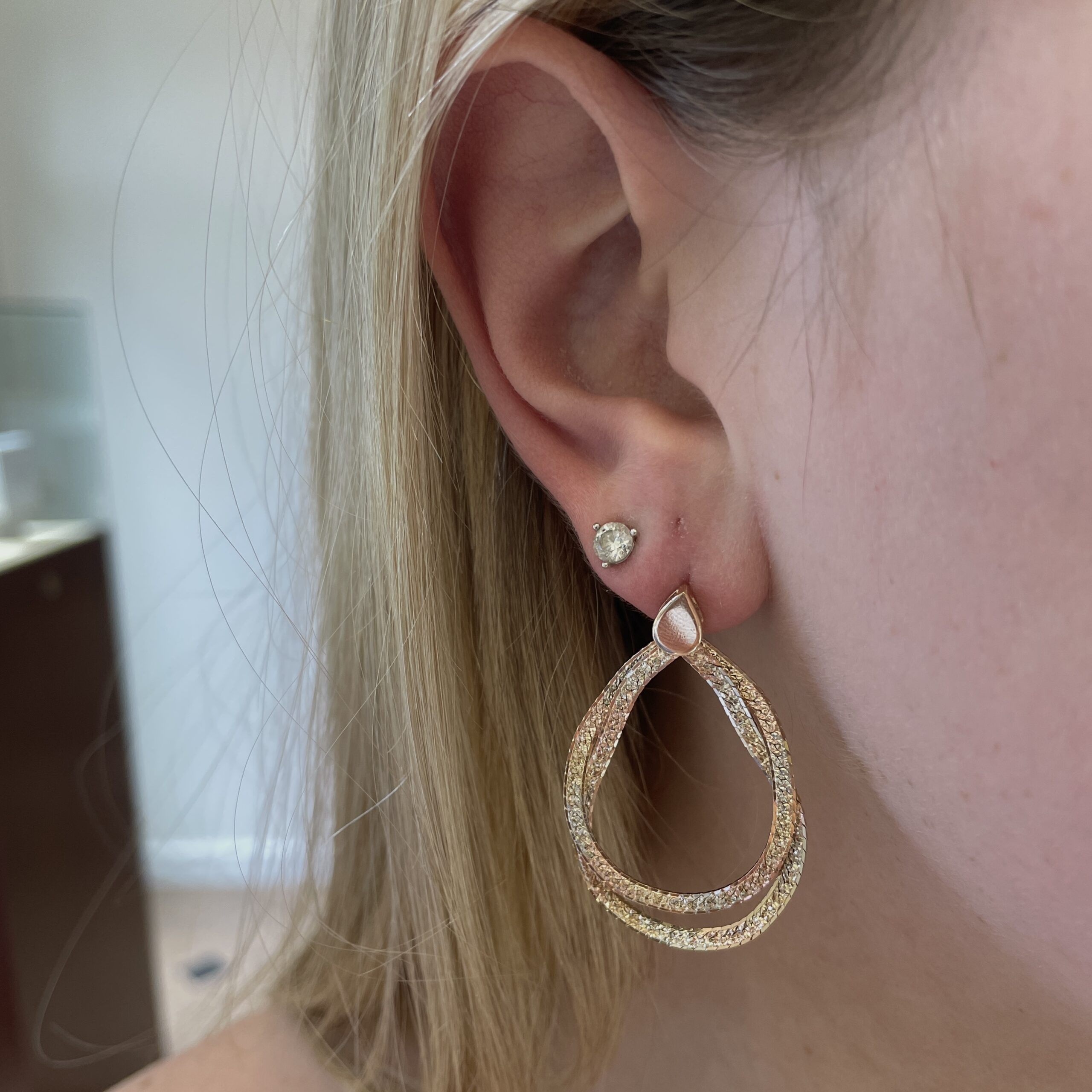 Estate: Tri Tone Gold Double Loop Diamond Cut Herringbone Earrings