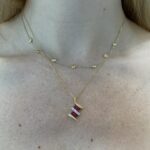 Estate: Yellow Gold Ruby and Diamond Pendant