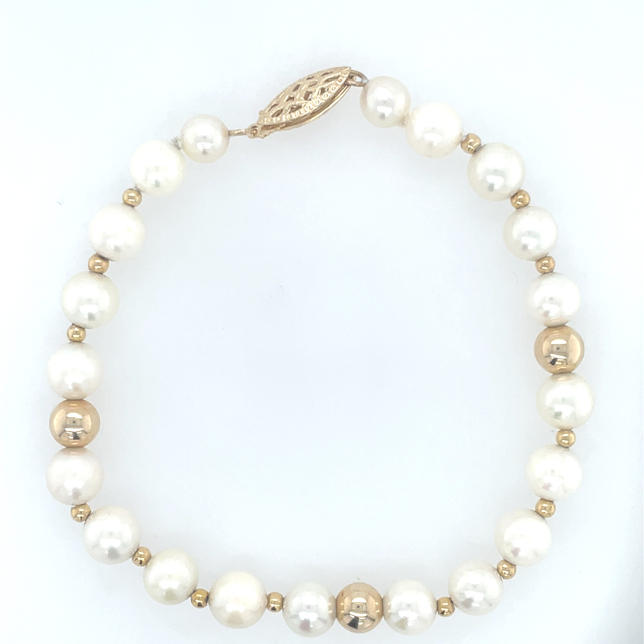 Estate: Yellow Gold Bead and Freshwater Pearl Row Bracelet