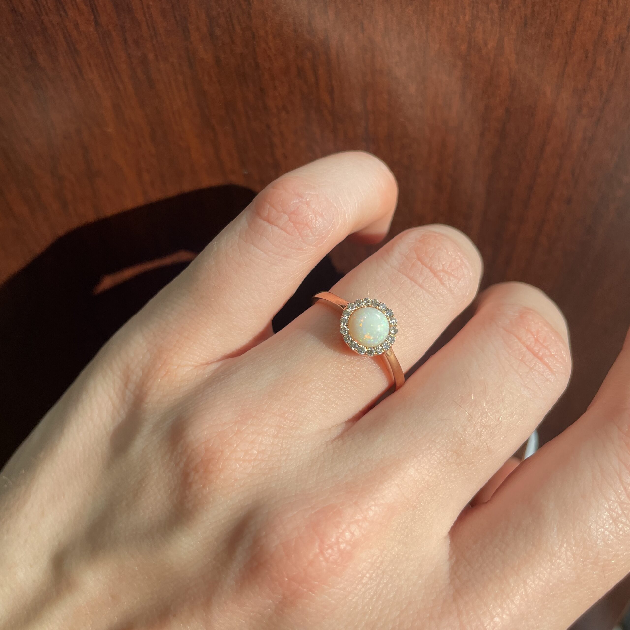 Estate: Rose Gold Opal Ring with Diamond Halo